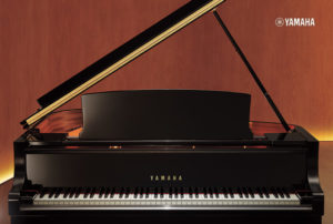 Yamaha CX grand piano, front view